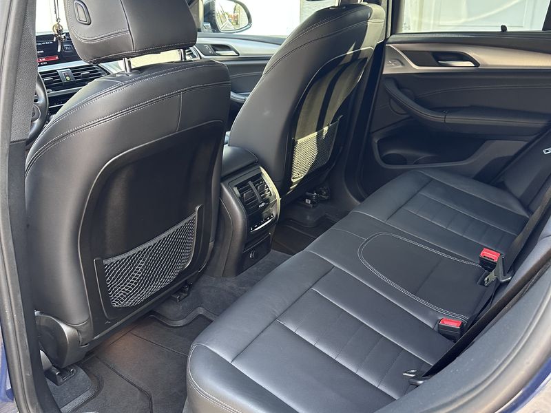 BMW X3 rear leather seats after shampoo and conditioning