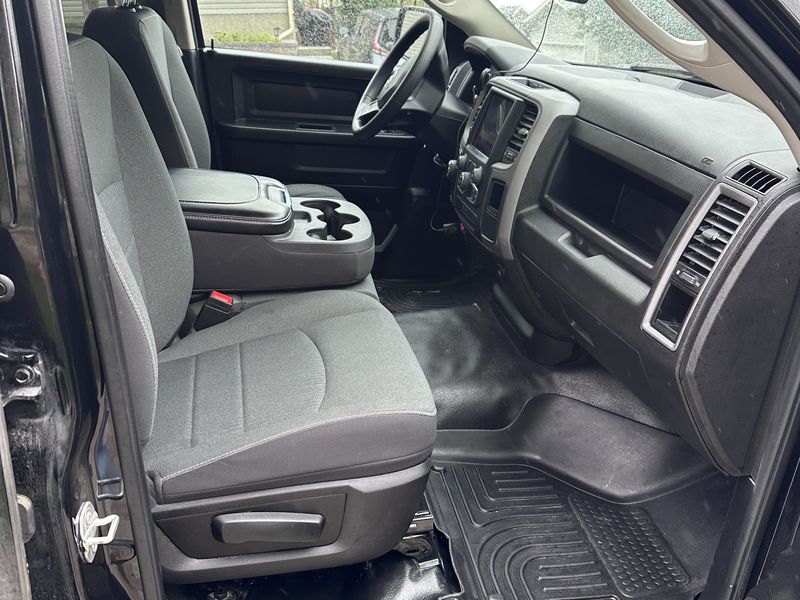 Work truck front seat and console after interior detailing
