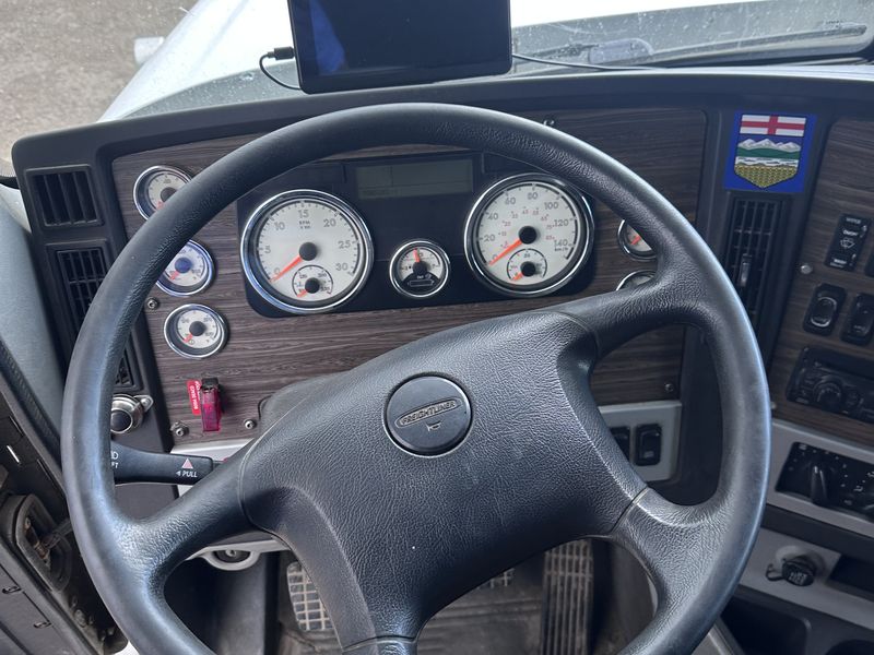 Highway tractor cab interior after detailing in Calgary