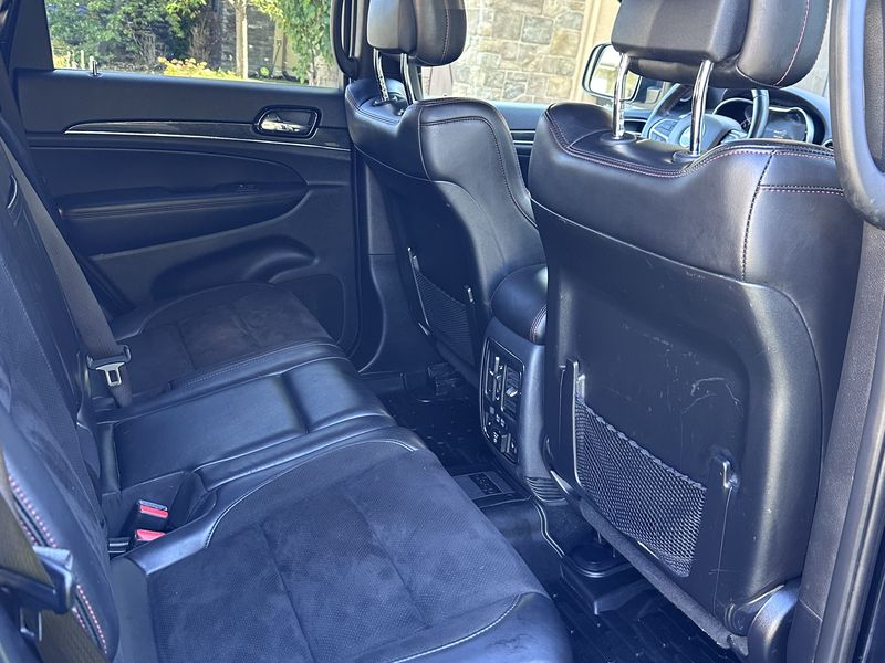 Rear seats and carpet cleaned of pet hair and odour